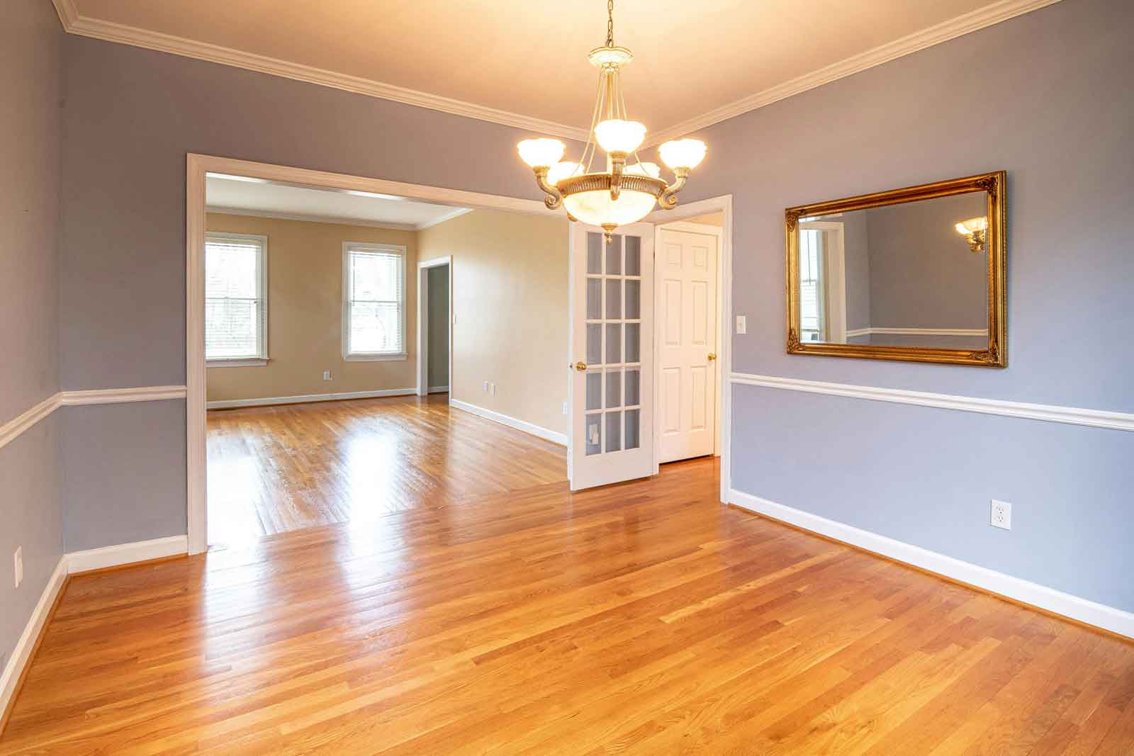 empty house with hardwood floors and painted walls